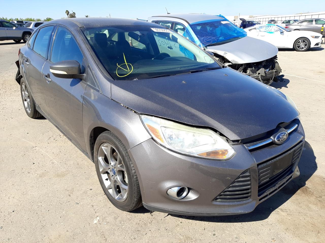 FORD FOCUS SE 2013 con VIN 1FADP3F20DL252722 - Foto de la subasta