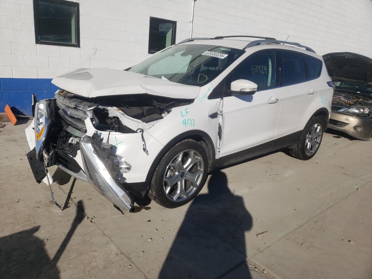 Photo 2 from auction – 2017 FORD ESCAPE TIT with VIN 1FMCU9J96HUA14360