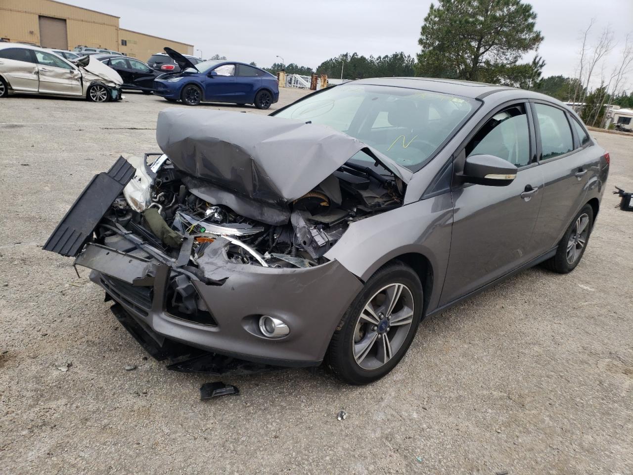 Photo 2 from auction – 2014 FORD FOCUS SE with VIN 1FADP3F29EL359477