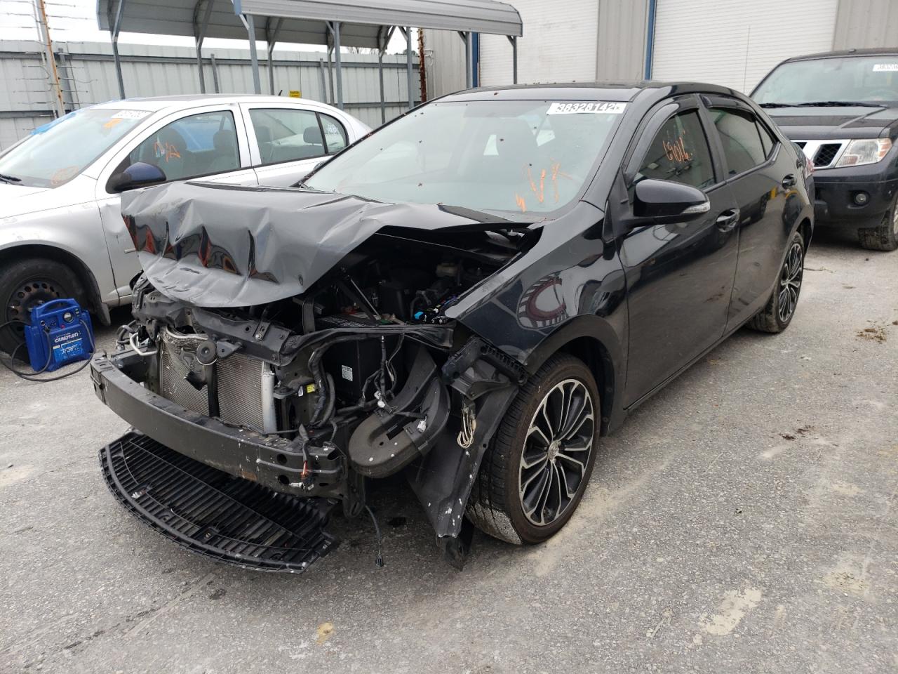 Photo 2 from auction – 2014 TOYOTA COROLLA L with VIN 2T1BURHEXEC211088