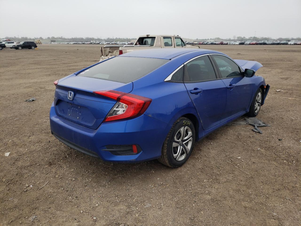 Photo 4 from auction – 2018 HONDA CIVIC LX with VIN 19XFC2F56JE012601