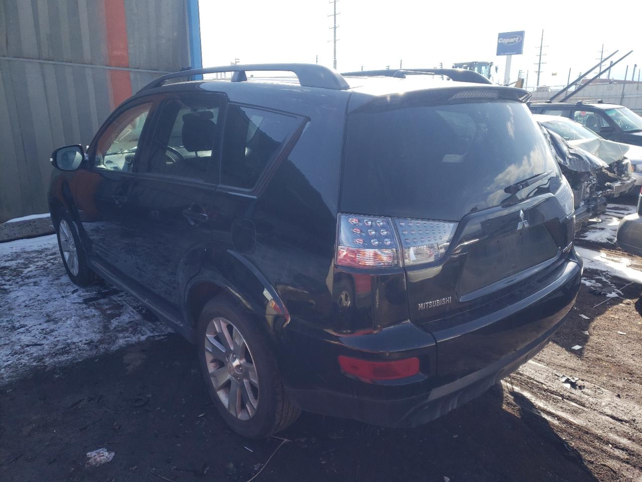 Photo 3 from auction – 2011 MITSUBISHI OUTLANDER with VIN JA4JT3AW4BU025411