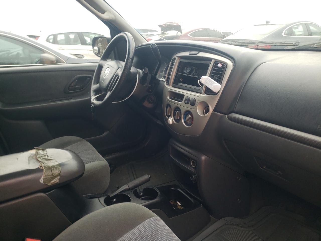 Photo 9 from auction – 2003 MAZDA TRIBUTE LX with VIN 4F2YZ04193KM46958