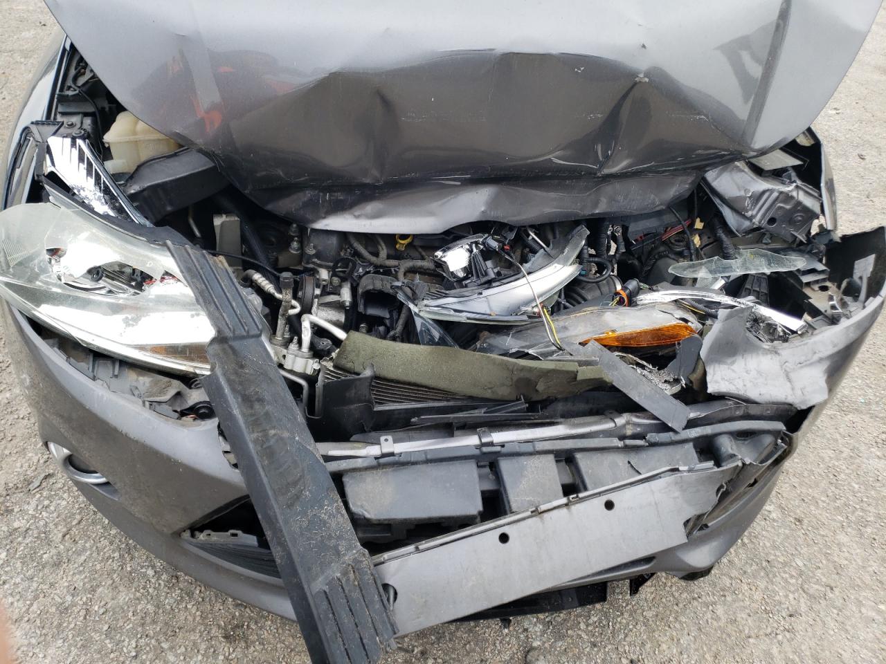 Photo 9 from auction – 2014 FORD FOCUS SE with VIN 1FADP3F29EL359477
