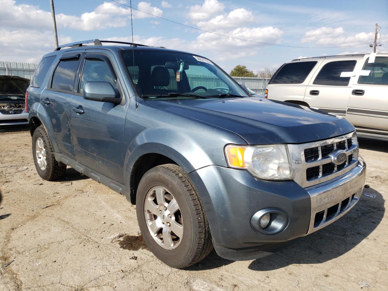 FORD ESCAPE LIM 2011 with VIN 1FMCU9EGXBKC12175 - Photo from auction