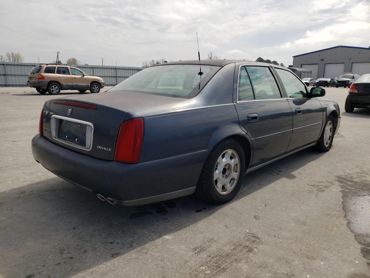 Photo 16 from auction – 2001 CADILLAC DEVILLE with VIN 1G6KD54Y31U168366