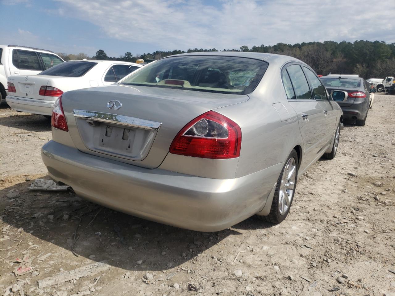 Photo 4 from auction – 2003 INFINITI Q45 with VIN JNKBF01A23M102295