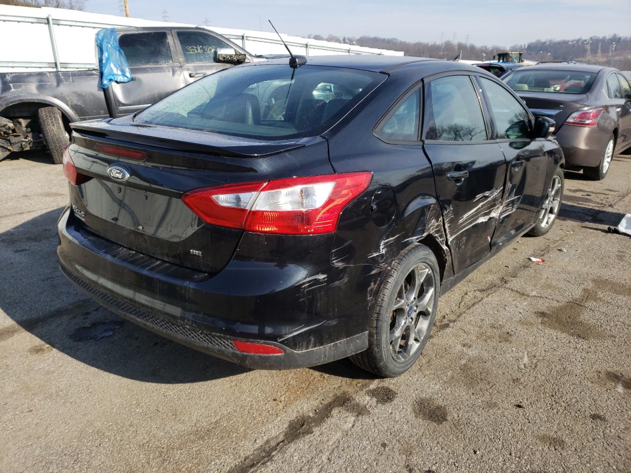 Photo 4 from auction – 2014 FORD FOCUS SE with VIN 1FADP3F28EL307046
