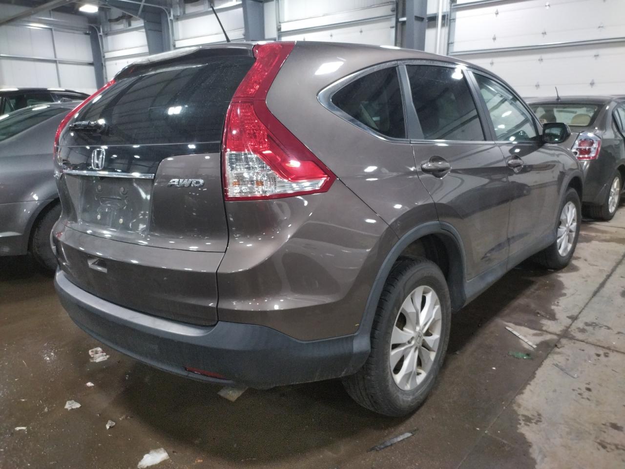 Photo 4 from auction – 2014 HONDA CR-V EX with VIN 2HKRM4H58EH624223