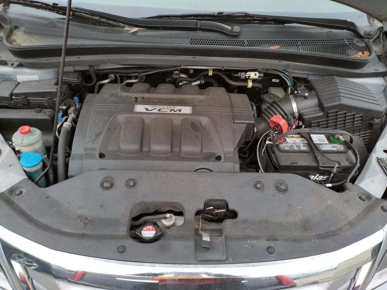 Photo 7 from auction – 2010 HONDA ODYSSEY EX with VIN 5FNRL3H73AB113090