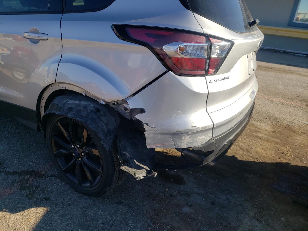 Photo 9 from auction – 2017 FORD ESCAPE SE with VIN 1FMCU9GD7HUC66310