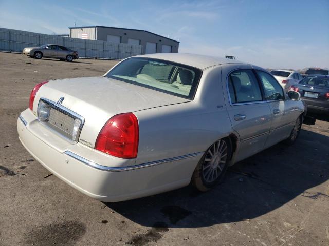 Photo 4 from auction – 2004 LINCOLN TOWN CAR U with VIN 1LNHM83W44Y677769