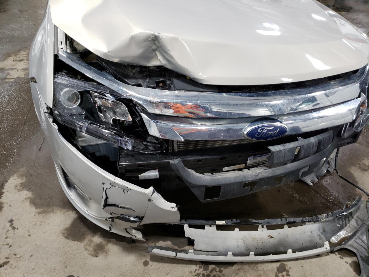 Photo 9 from auction – 2010 FORD FUSION S with VIN 3FAHP0GA4AR242519