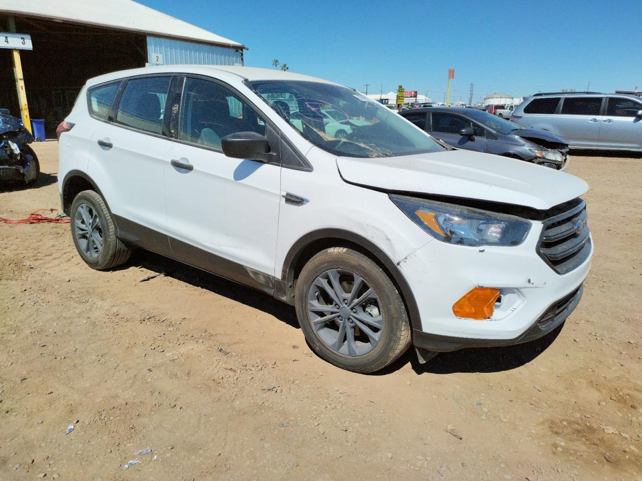 FORD ESCAPE S 2019 with VIN 1FMCU0F77KUC35105 - Photo from auction