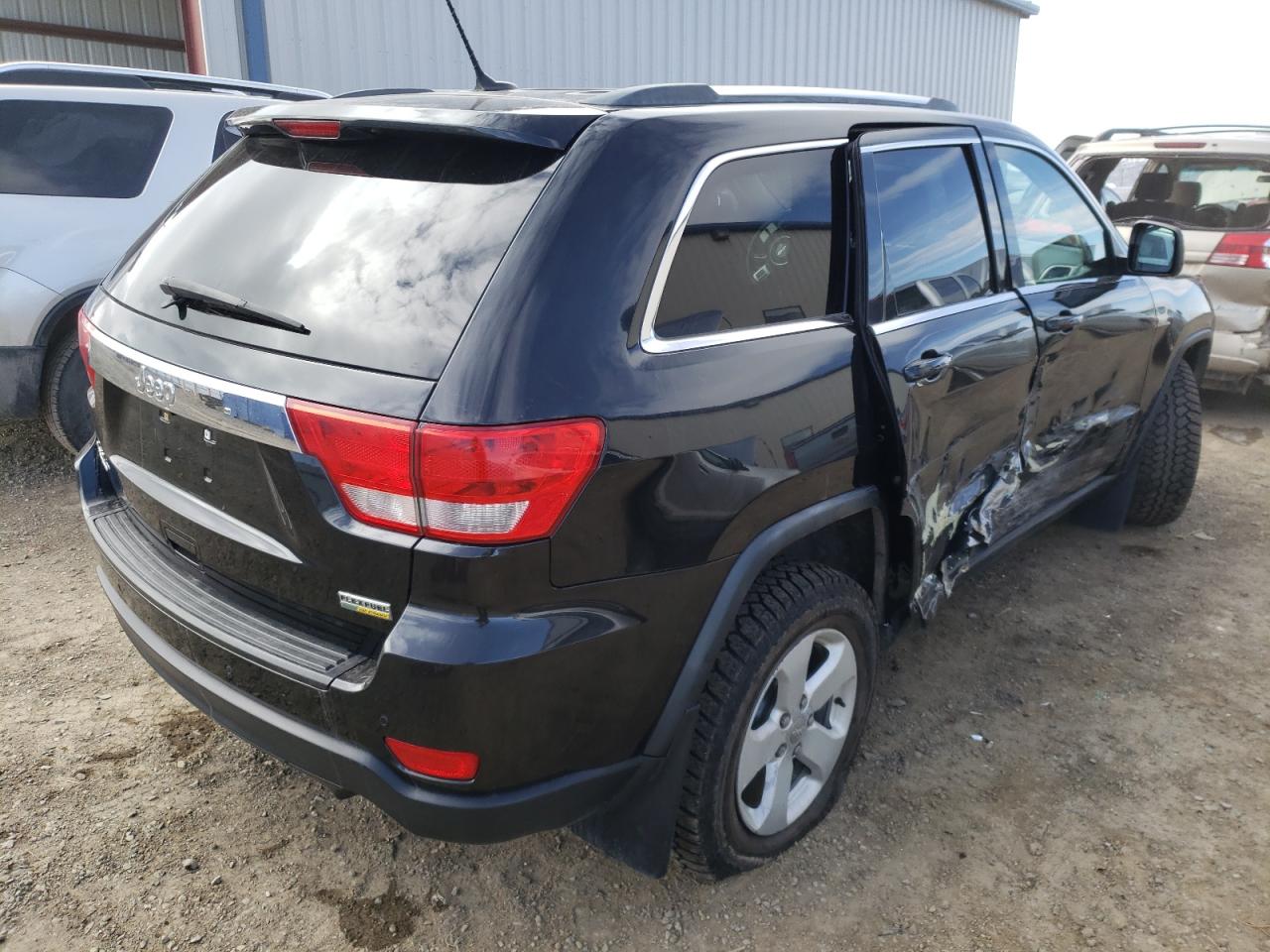 Photo 4 from auction – 2011 JEEP GRAND CHER with VIN 1J4RR4GG4BC537716