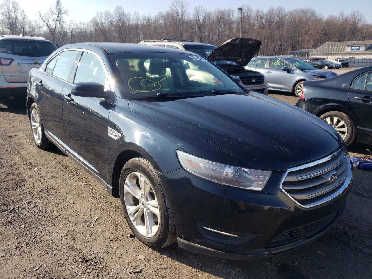 FORD TAURUS SEL 2014 with VIN 1FAHP2H83EG122490 - Photo from auction