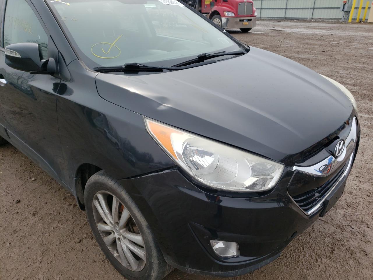 Photo 9 from auction – 2012 HYUNDAI TUCSON GLS with VIN KM8JUCACXCU542864