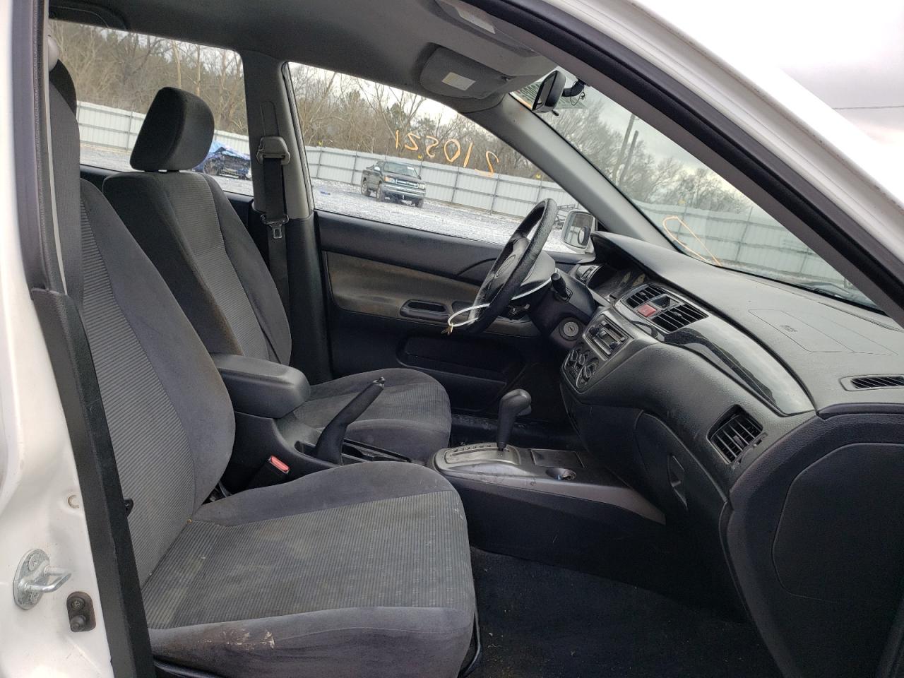 Photo 5 from auction – 2004 MITSUBISHI LANCER LS with VIN JA3AD29F84U010509