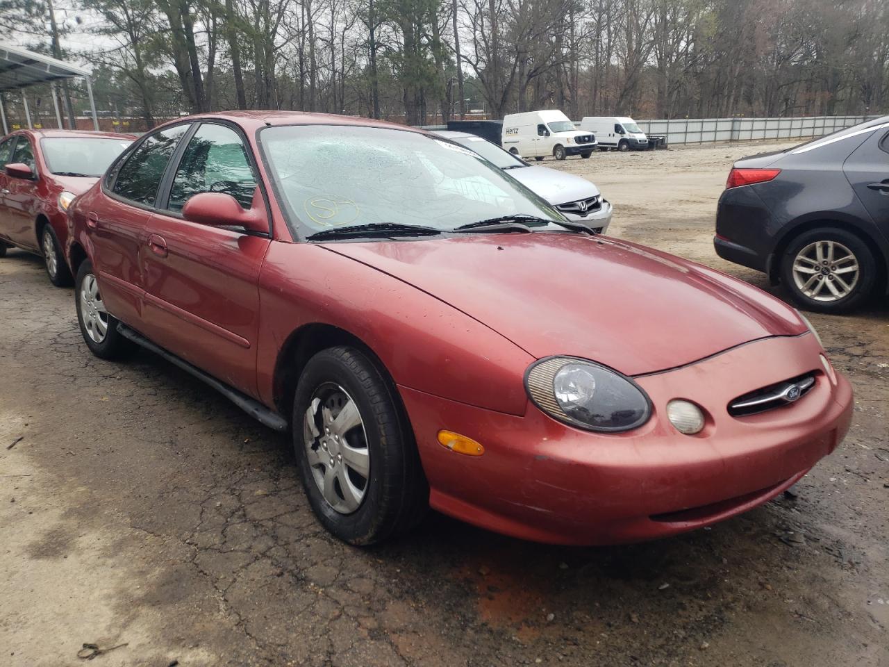 FORD TAURUS SE 1999 with VIN 1FAFP53U0XA116858 - Photo from auction