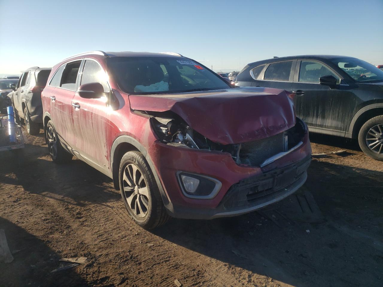 KIA SORENTO EX 2016 with VIN 5XYPHDA56GG081311 - Photo from auction
