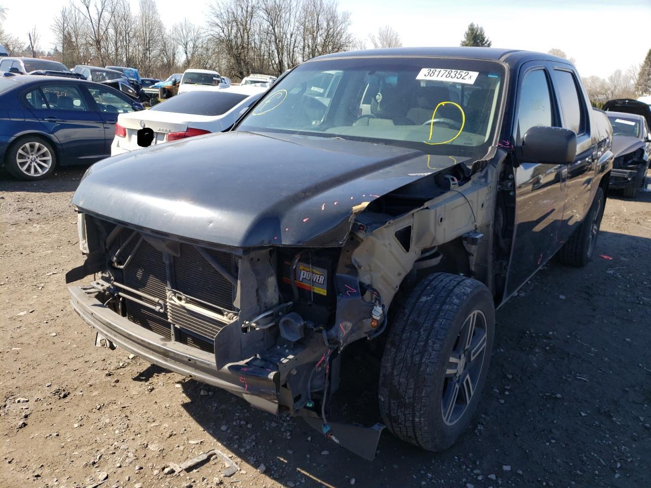 Photo 2 from auction – 2012 HONDA RIDGELINE with VIN 5FPYK1F76CB451065