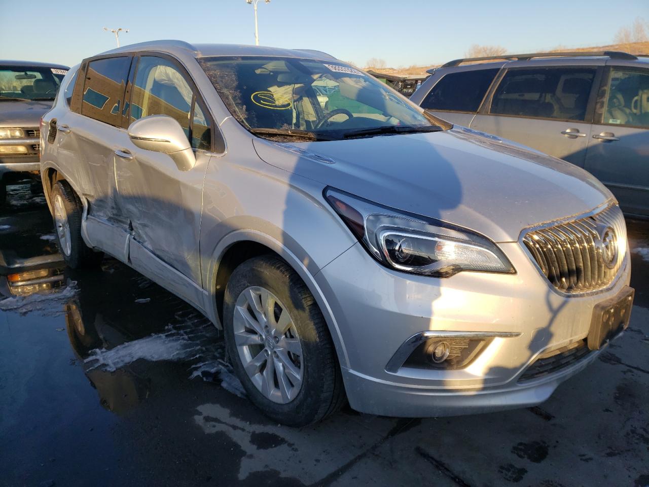 BUICK ENVISION E 2018 with VIN LRBFX2SA0JD002704 - Photo from auction