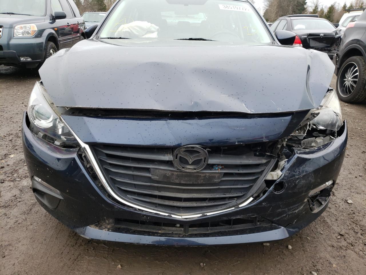 Photo 9 from auction – 2014 MAZDA 3 TOURING with VIN JM1BM1L79E1212232