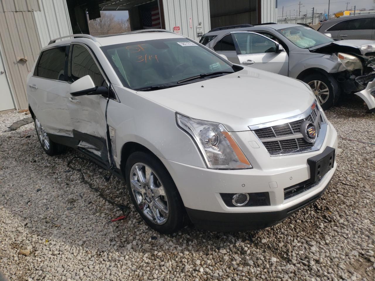 CADILLAC SRX PERFOR 2012 with VIN 3GYFNBE33CS557437 - Photo from auction