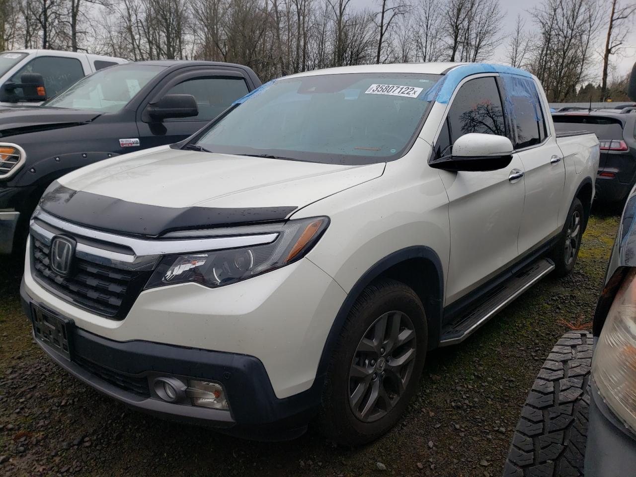Photo 2 from auction – 2019 HONDA RIDGELINE with VIN 5FPYK3F76KB007906