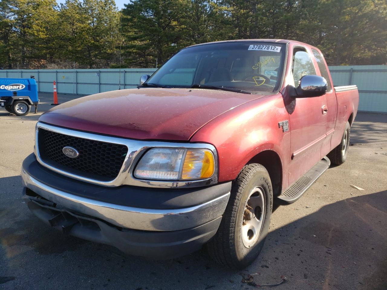 Photo 2 from auction – 2000 FORD F150 with VIN 1FTRX17W2YNC38269