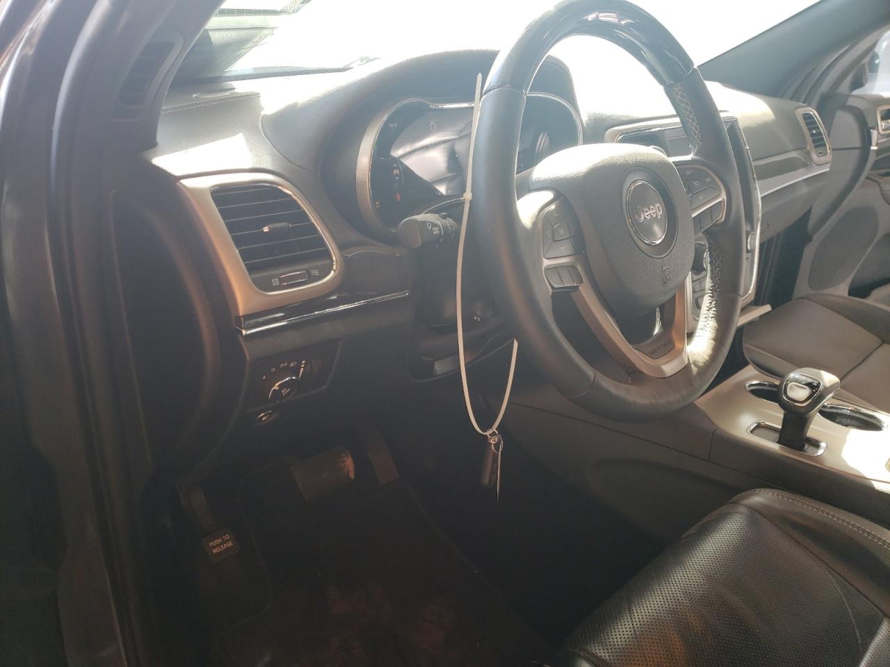 Photo 9 from auction – 2015 JEEP GRAND CHER with VIN 1C4RJECG3FC125995