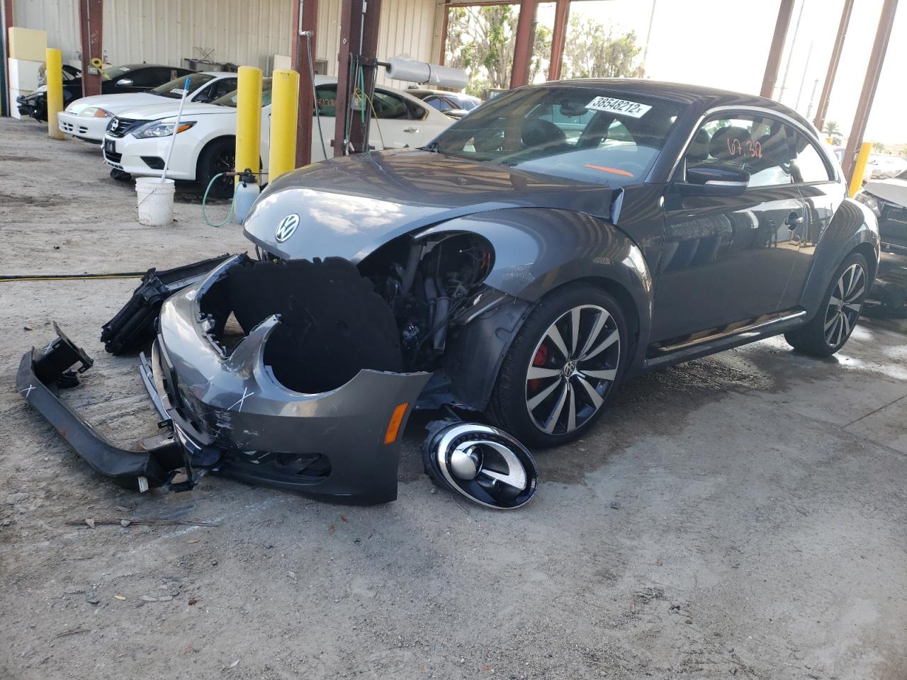 Photo 2 from auction – 2012 VOLKSWAGEN BEETLE TUR with VIN 3VWVA7AT4CM660447