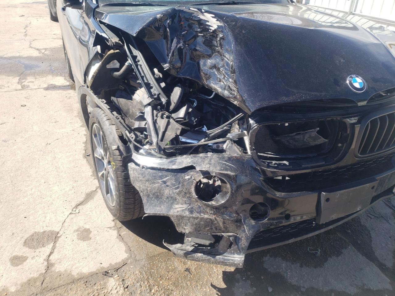 Photo 9 from auction – 2015 BMW X5 XDRIVE3 with VIN 5UXKR0C54F0P02917
