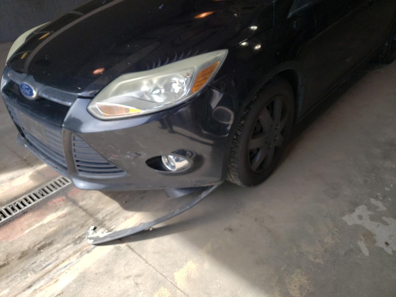 Photo 9 from auction – 2012 FORD FOCUS SE with VIN 1FAHP3K25CL145767