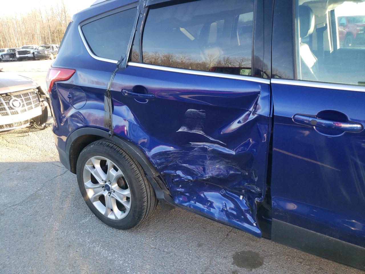 Photo 9 from auction – 2014 FORD ESCAPE TIT with VIN 1FMCU0JX2EUC29210