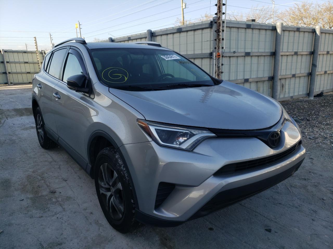 Photo 1 from auction – 2016 TOYOTA RAV4 LE with VIN 2T3ZFREV8GW275037