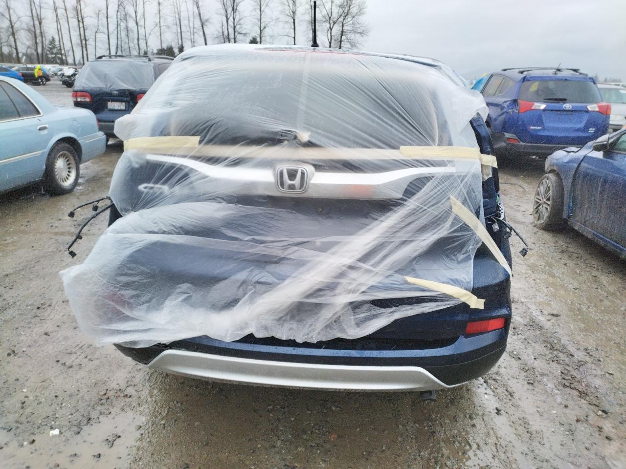Photo 9 from auction – 2016 HONDA CR-V EX with VIN 3CZRM3H57GG714110