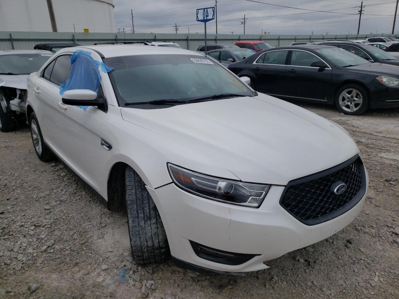 FORD TAURUS SEL 2017 with VIN 1FAHP2E8XHG125945 - Photo from auction