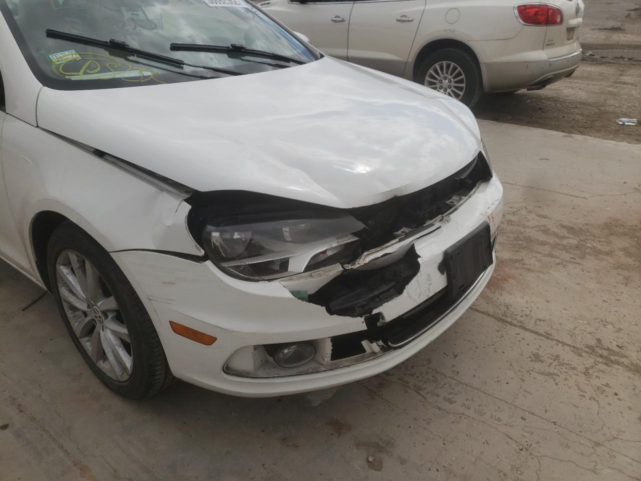 Photo 9 from auction – 2014 VOLKSWAGEN EOS KOMFOR with VIN WVWBW8AH8EV001014