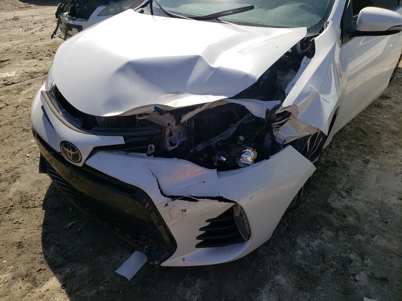 Photo 9 from auction – 2017 TOYOTA COROLLA L with VIN 5YFBURHEXHP615402