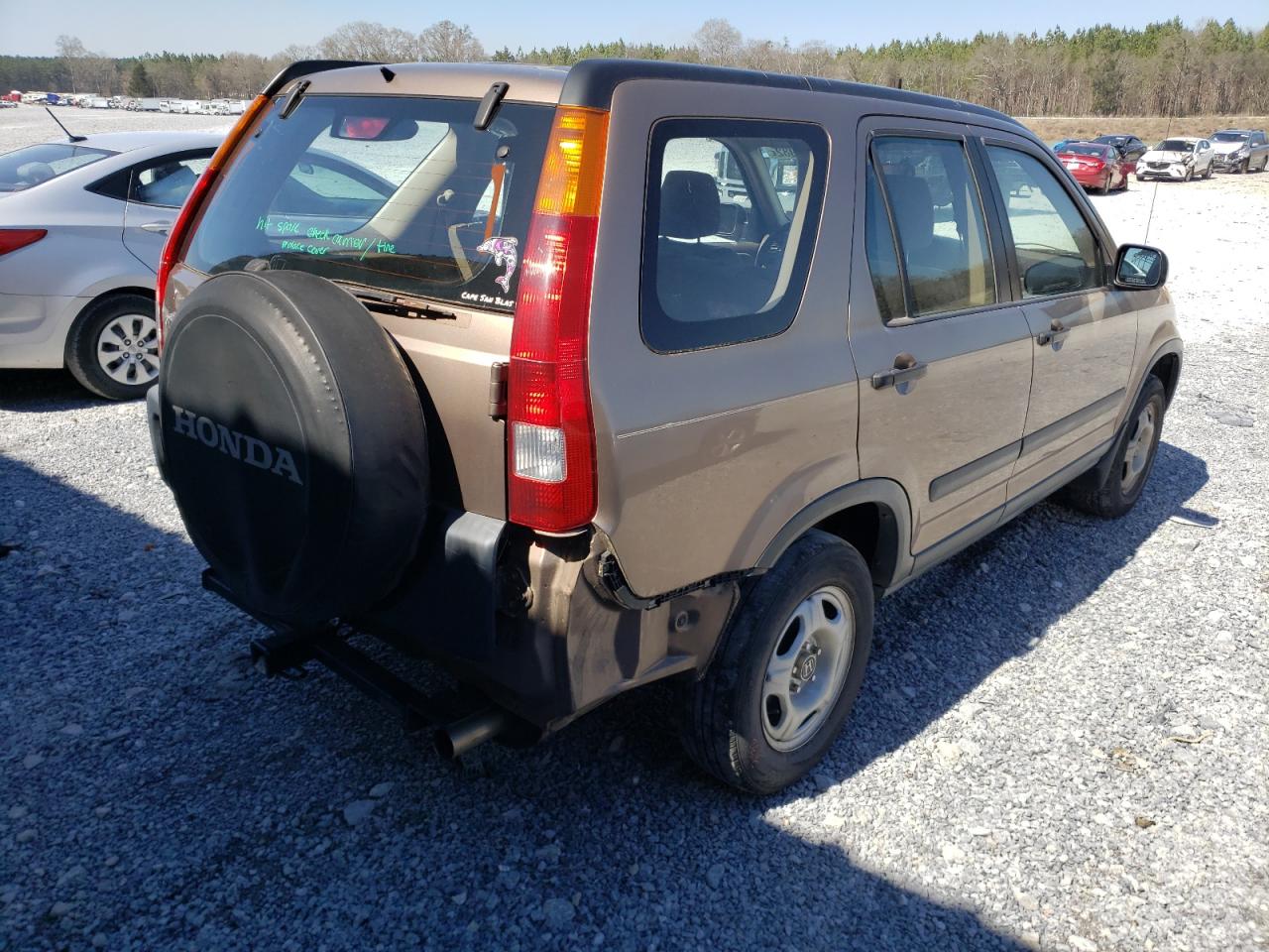 Photo 4 from auction – 2002 HONDA CR-V LX with VIN JHLRD78592C052087