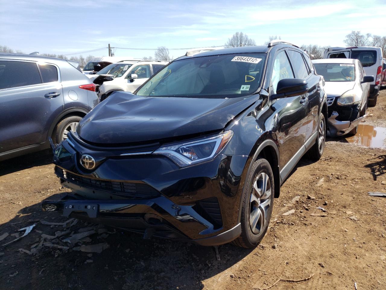 Photo 2 from auction – 2018 TOYOTA RAV4 LE with VIN 2T3BFREV7JW828334