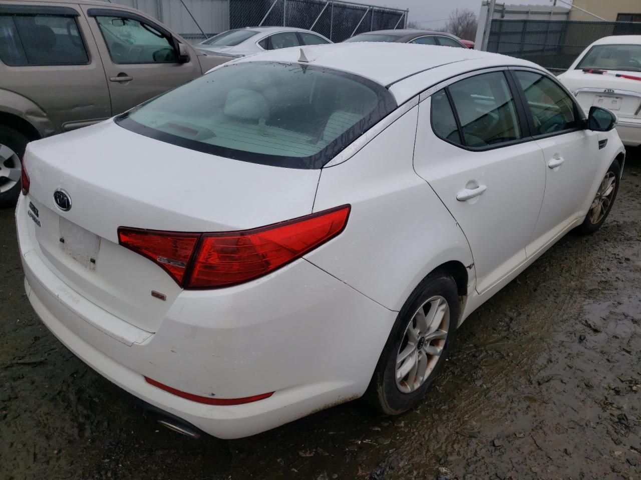 Photo 17 from auction – 2011 KIA OPTIMA LX with VIN KNAGM4A73B5127298