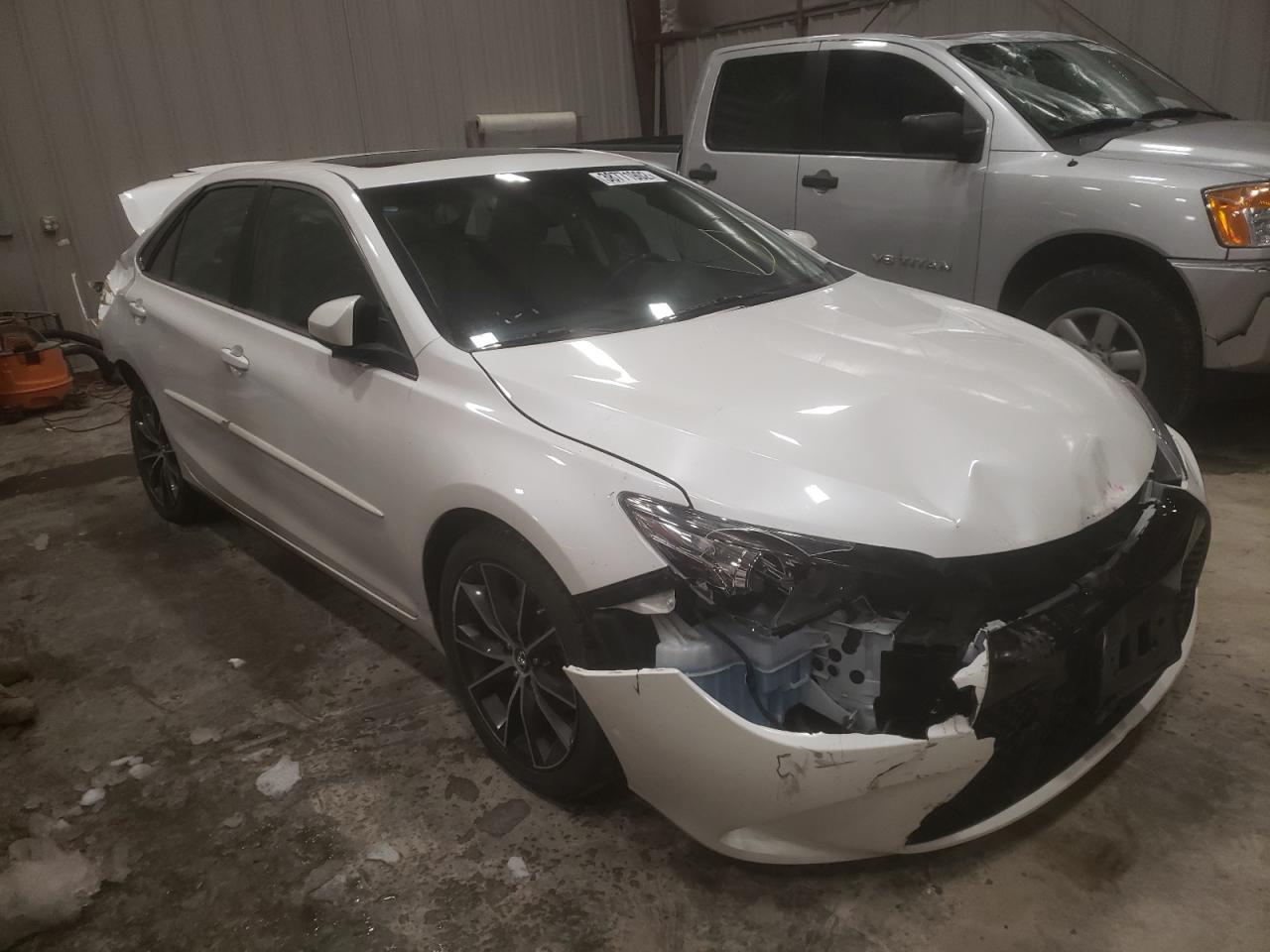 TOYOTA CAMRY LE 2016 with VIN 4T1BF1FKXGU573198 - Photo from auction