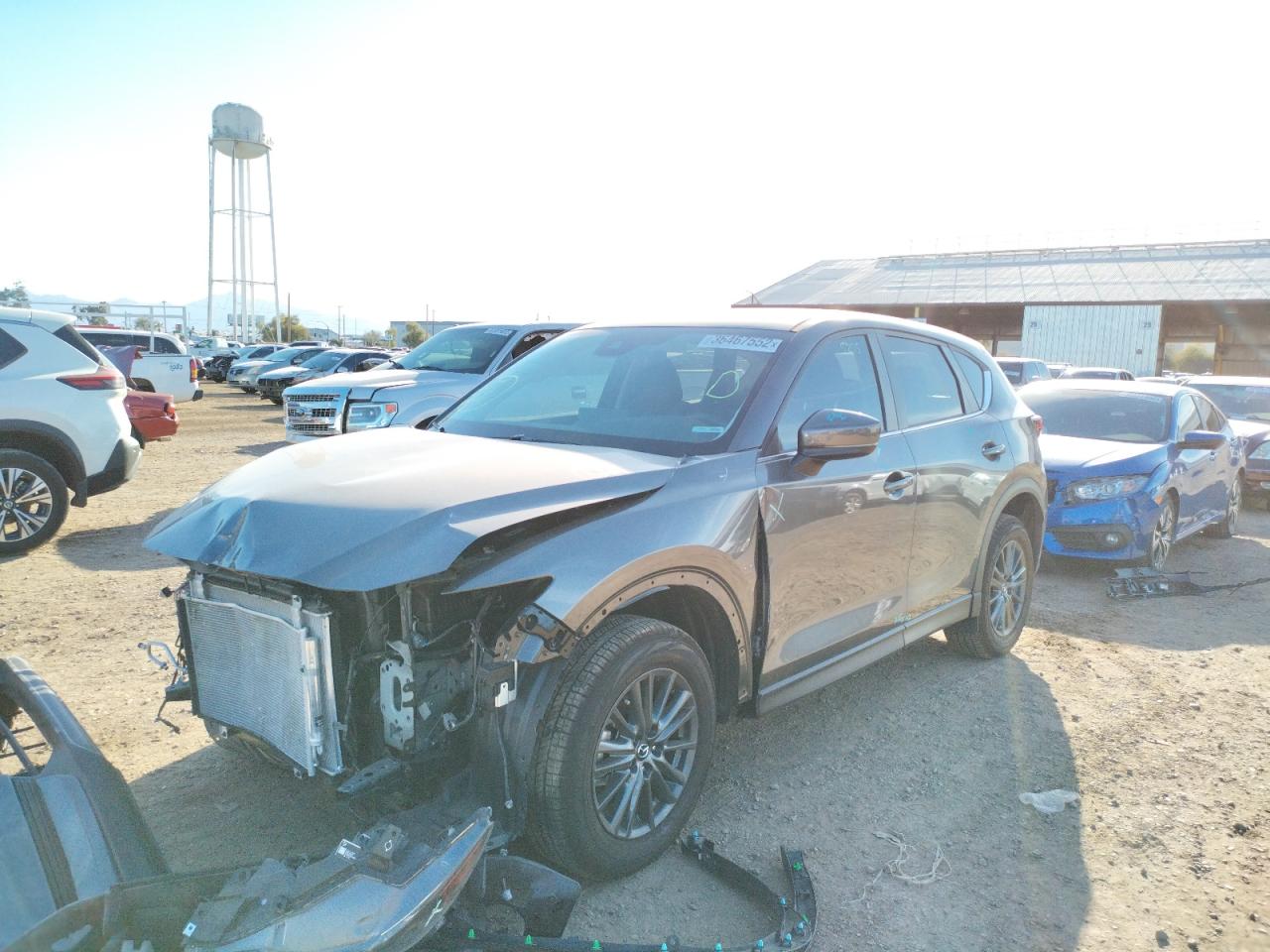 Photo 2 from auction – 2021 MAZDA CX-5 TOURI with VIN JM3KFACM1M1315909