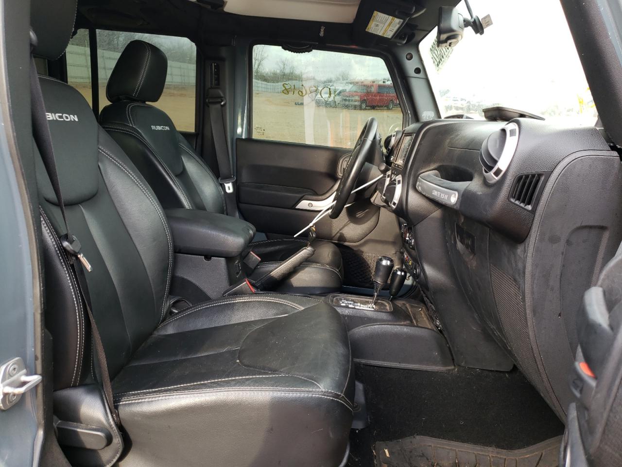 Photo 5 from auction – 2014 JEEP WRANGLER U with VIN 1C4BJWFG5EL120461