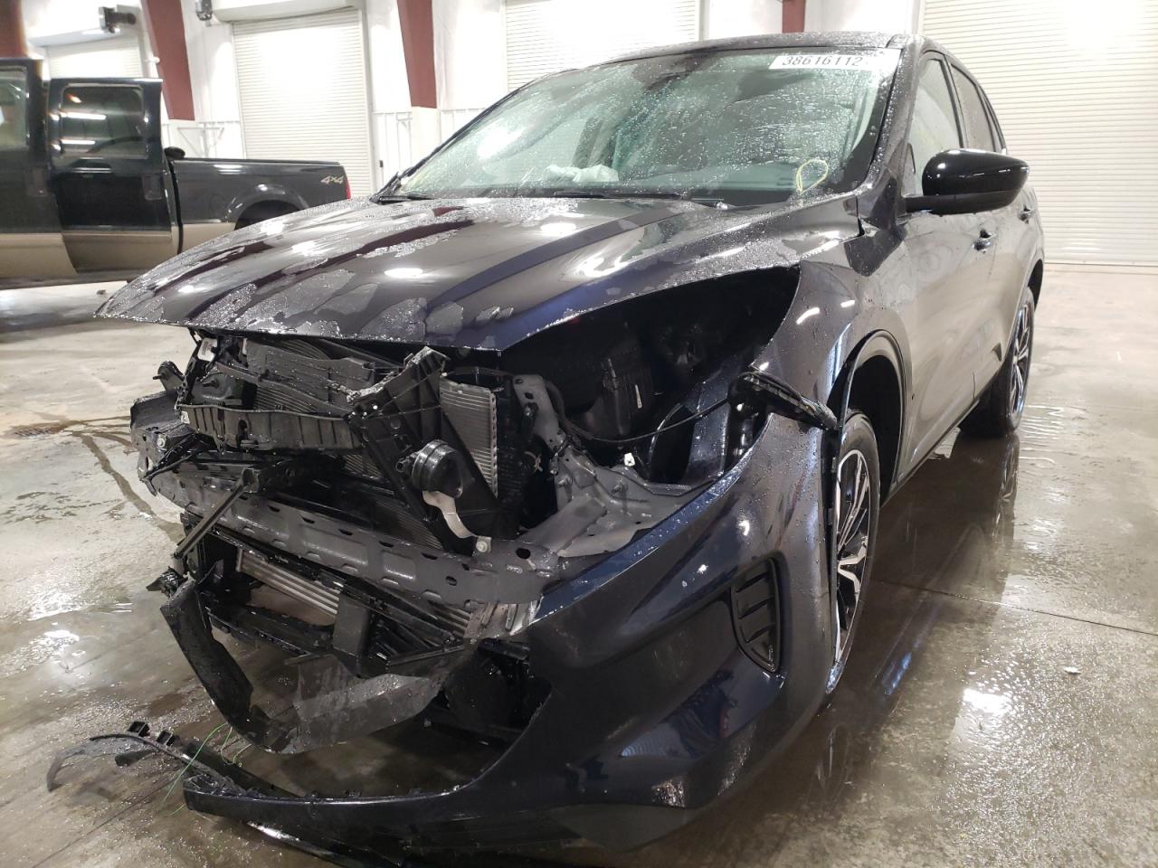Photo 2 from auction – 2021 FORD ESCAPE SE with VIN 1FMCU9G69MUB07154