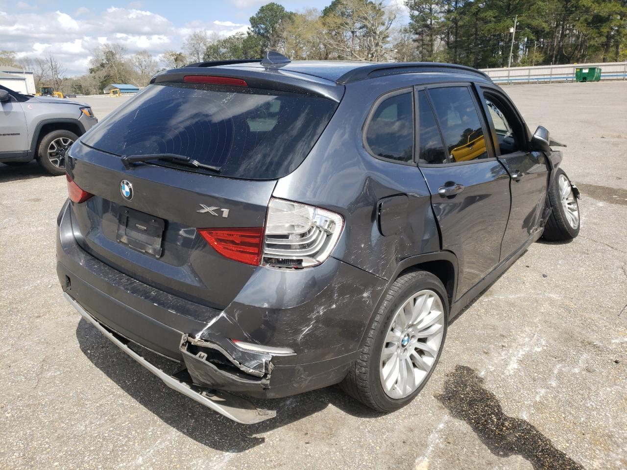 Photo 4 from auction – 2014 BMW X1 SDRIVE2 with VIN WBAVM1C56EVW49073