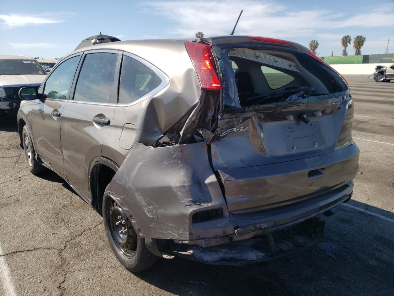 Photo 3 from auction – 2015 HONDA CR-V LX with VIN 3CZRM3H38FG703033