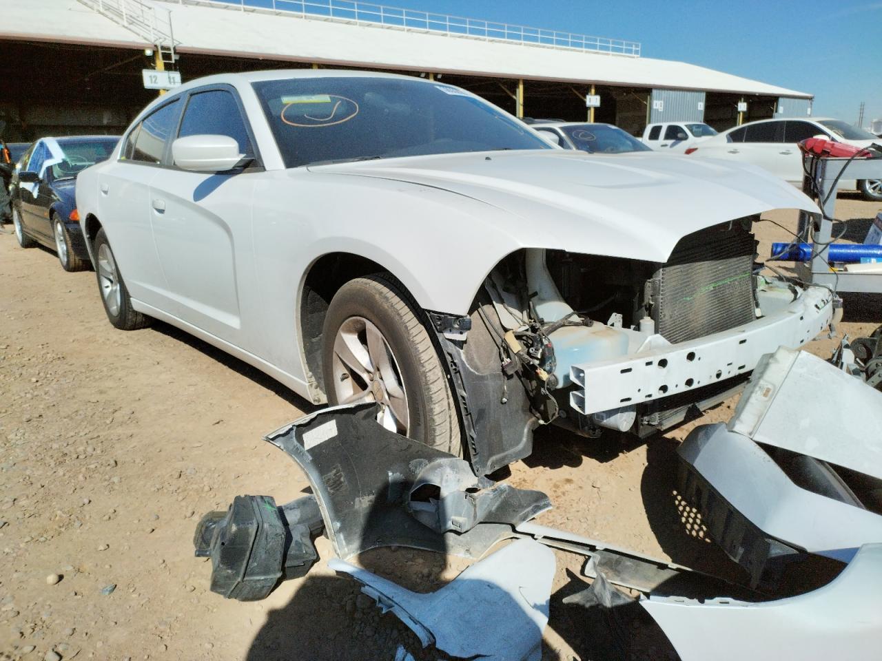DODGE CHARGER SE 2014 with VIN 2C3CDXBG8EH197785 - Photo from auction